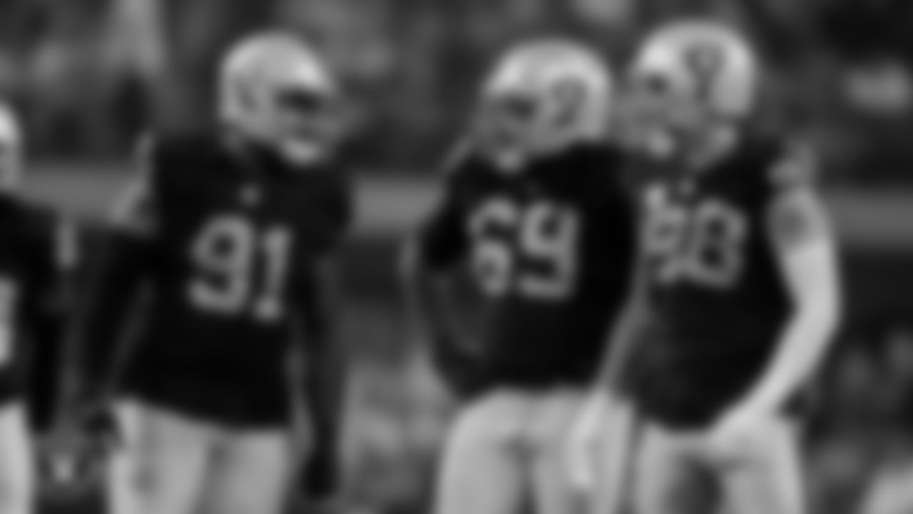 Las Vegas Raiders defensive tackle Bilal Nichols (91), defensive lineman Adam Butler (69) and defensive end Maxx Crosby (98) during the regular season home game against the Pittsburgh Steelers at Allegiant Stadium.