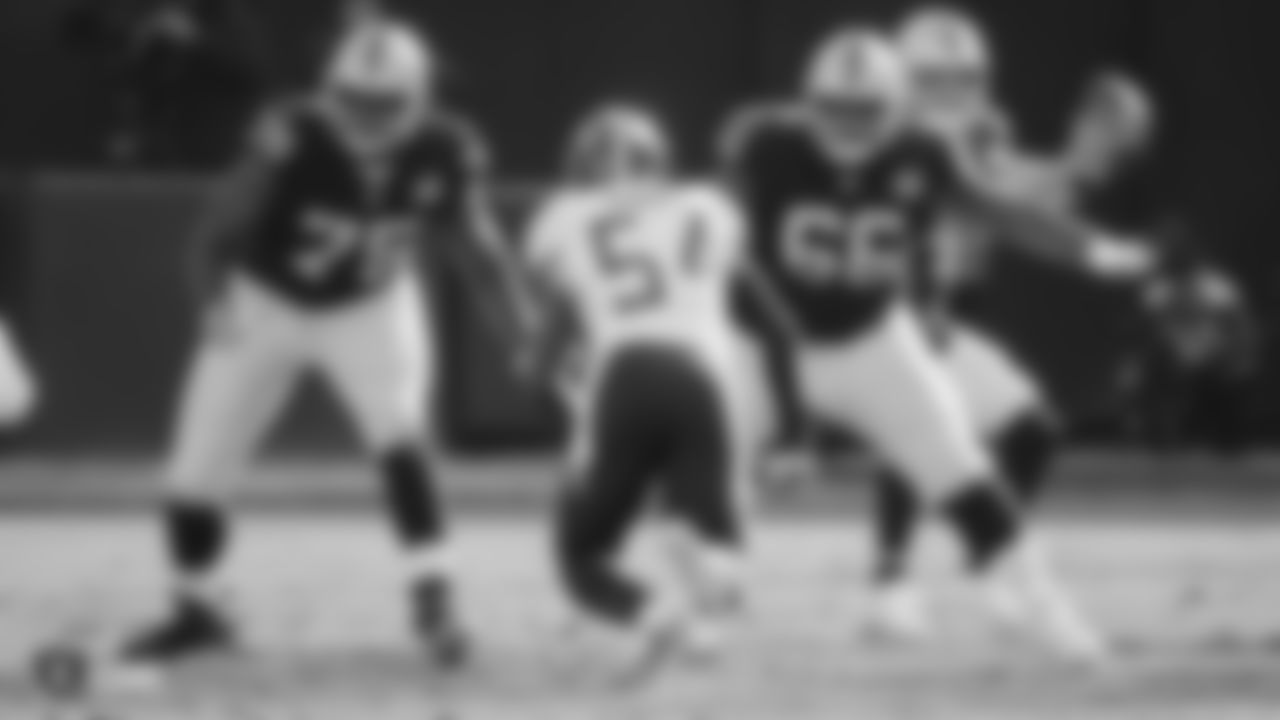 Raiders tackle Brandon Parker (75) and guard Gabe Jackson (66) during the regular season game against the Tennessee Titans at the Oakland-Alameda County Coliseum.