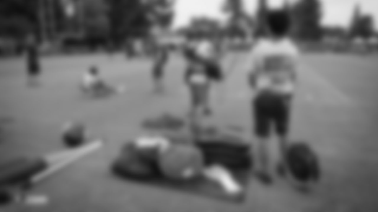 The Hard Knocks film crew on the field for practice at 2019 Training Camp.