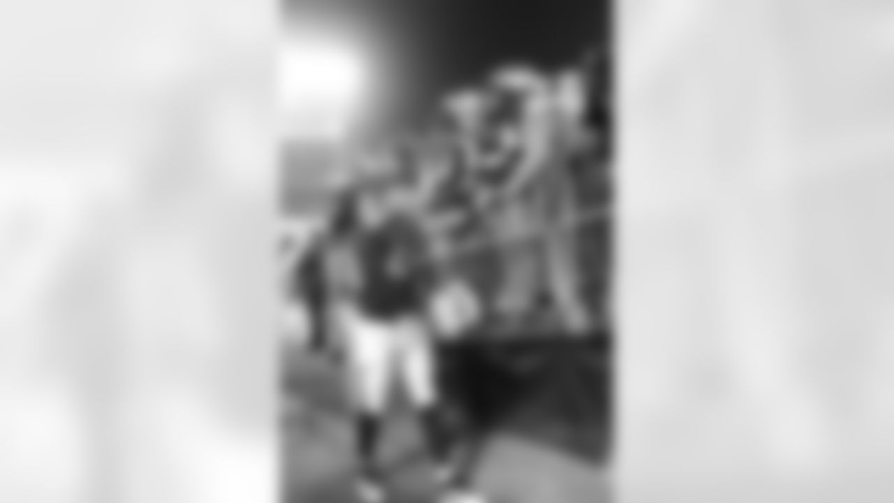 WR Damola Adeniji says hello to a fan.