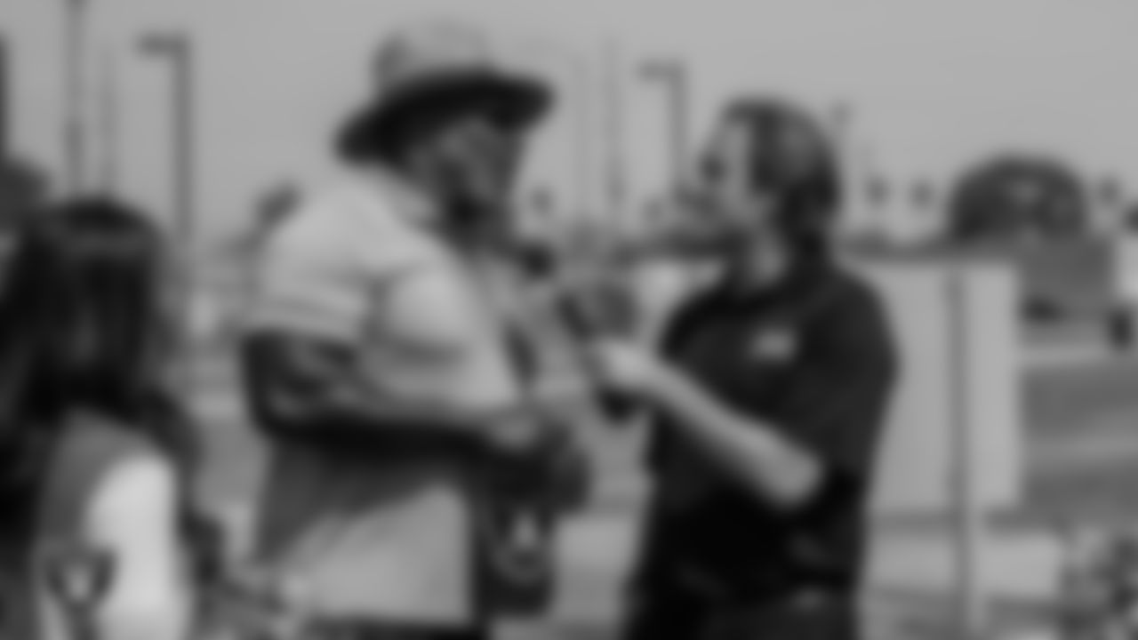 Las Vegas Raiders alumnus Roy Hart is interviewed by Fox5 reporter Mike Davis during the final day of construction of the Fox5 Super Build at Gary Reese Freedom Park.