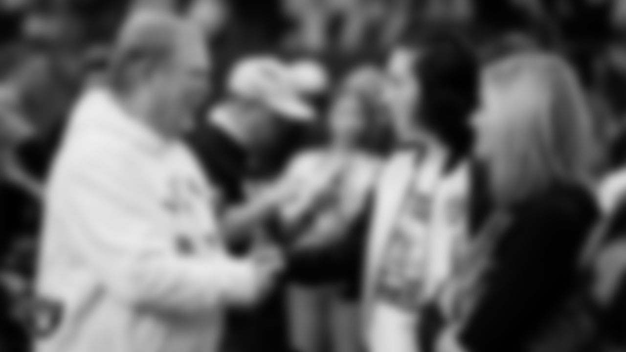 Las Vegas Raiders Owner Mark Davis with Make-A-Wish's Ella Maldonado before the Las Vegas Raiders' regular season home game against the New England Patriots at Allegiant Stadium.