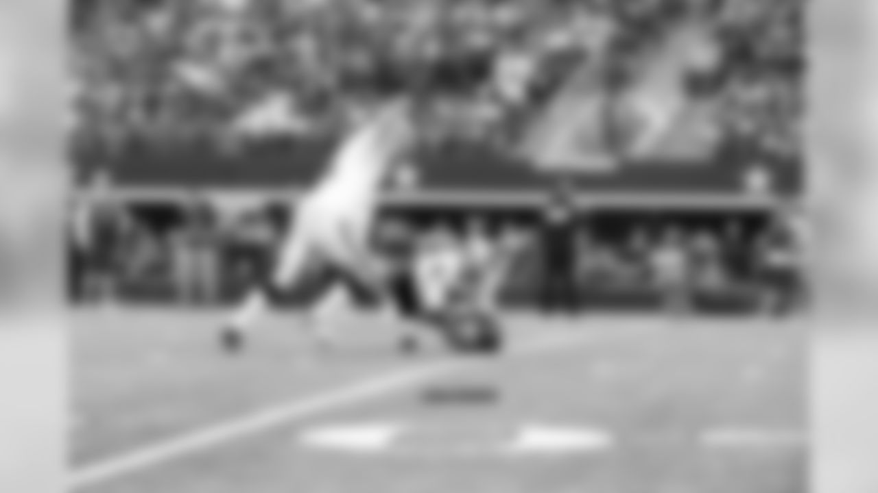 K Sebastian Janikowski kicks the extra point.