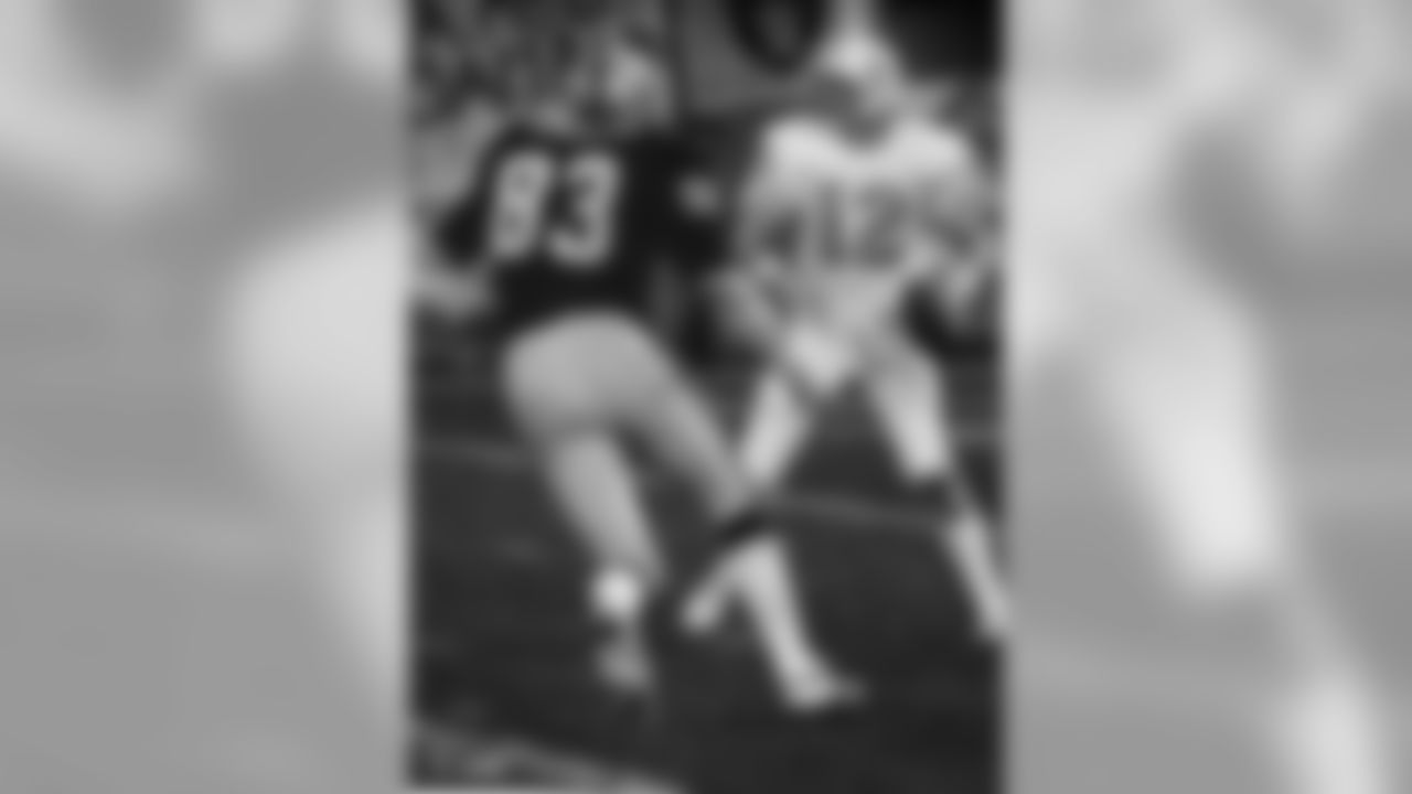 2This is a 1980 AFC Wild Card game action photo of Oakland Raiders linebacker Ted Hendricks (83) moving in to sack Houston Oilers quarterback Ken Stabler on the 2-yard line during a home playoff game at the Oakland-Alameda County Coliseum in Oakland, California on December 28, 1980 when the Oakland Raiders defeated the Houston Oilers 27 - 7 in the AFC Wild Card game.