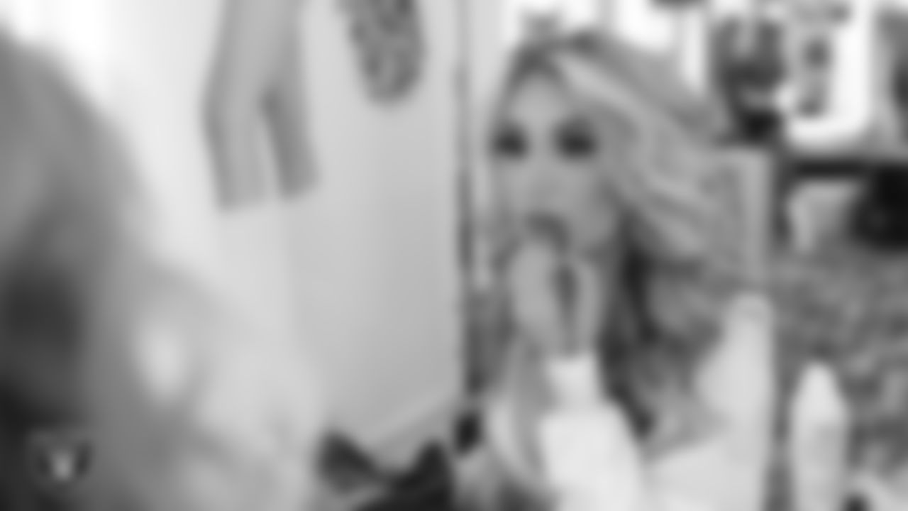 Raiderette Taylor in the locker room before the regular season home game against the Chicago Bears.