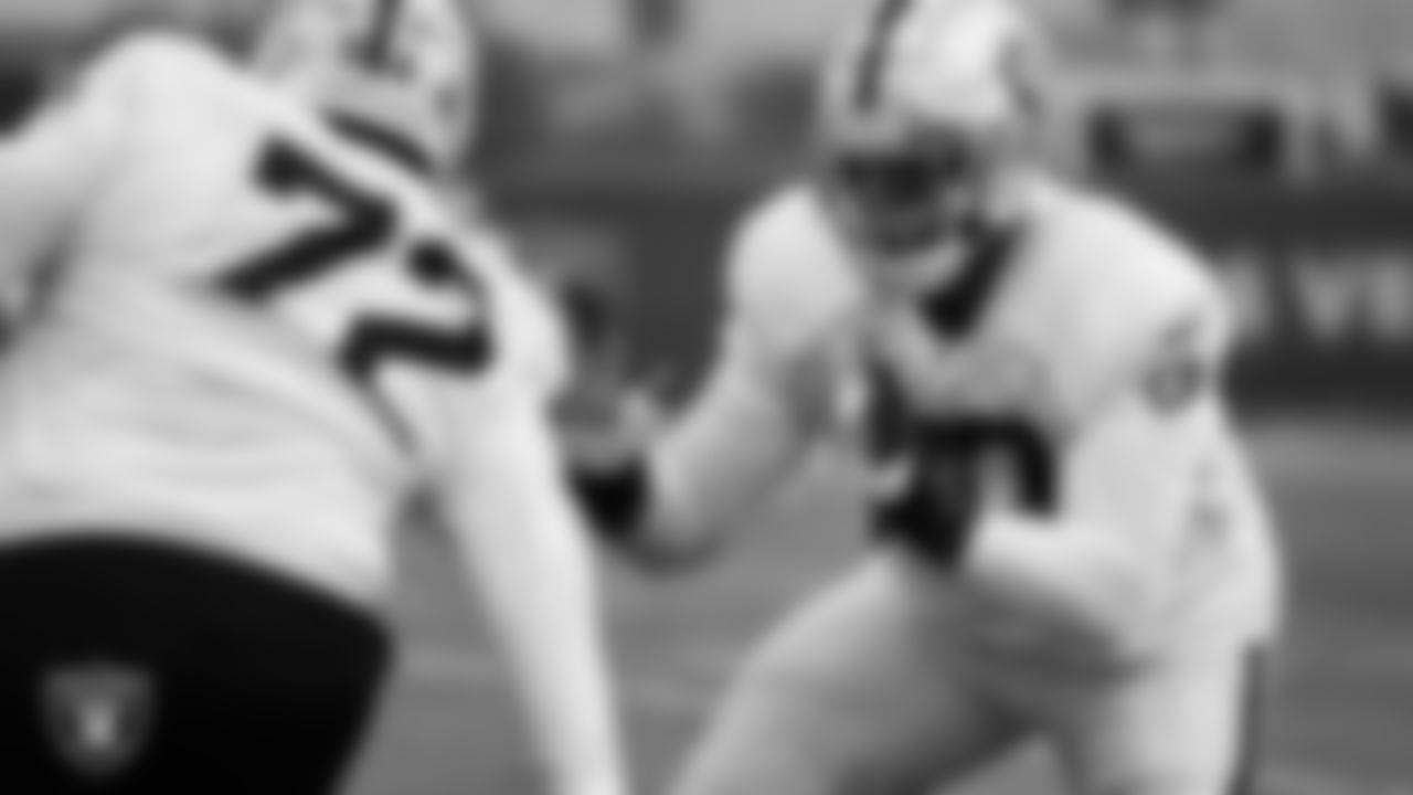 Las Vegas Raiders offensive lineman Jermaine Eluemunor (72) and tackle Thayer Munford Jr. (77) during practice at Intermountain Healthcare Performance Center.