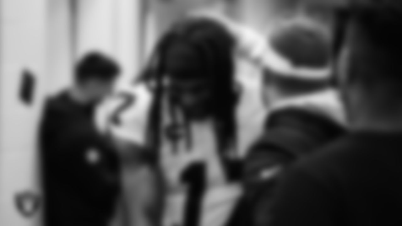 Las Vegas Raiders wide receiver Davante Adams (17) and Head Coach Josh McDaniels in the locker room after the regular season away game against the Seattle Seahawks at Lumen Field.