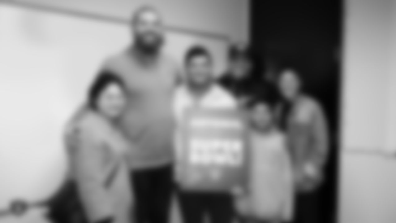 UCSF Benioff Oakland patient Antonio and his family attend Raiders walk through for a chance to meet the team before tight end Lee Smith helps with a surprise reveal with two Super Bowl 53 tickets in Atlanta, Georgia for Antonio and his dad, Thursday, December 27, 2018, in Alameda, California.