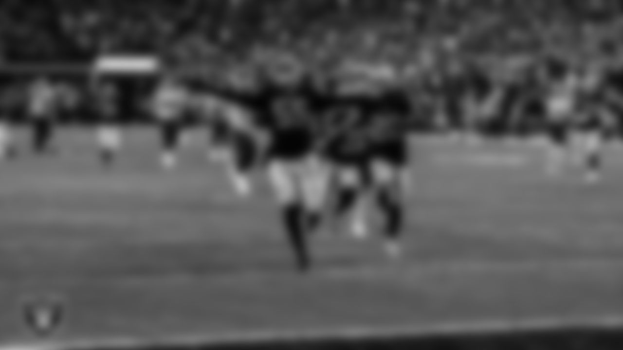 Las Vegas Raiders defensive end Chandler Jones (55) returns a fumble for a 48-yard touchdown during the regular season home game against the New England Patriots at Allegiant Stadium.
