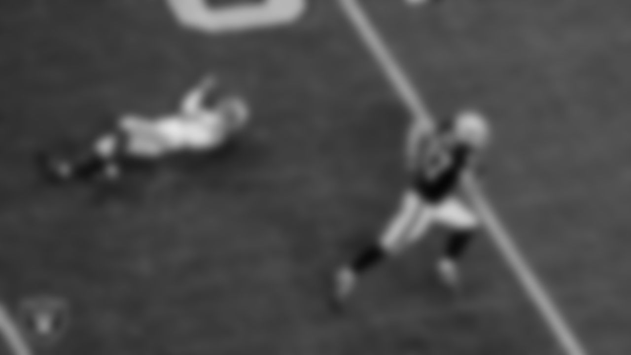 Las Vegas Raiders tight end Foster Moreau (87) heads to the end zone on a 47-yard touchdown catch during the regular season game against the Indianapolis Colts at Allegiant Stadium.