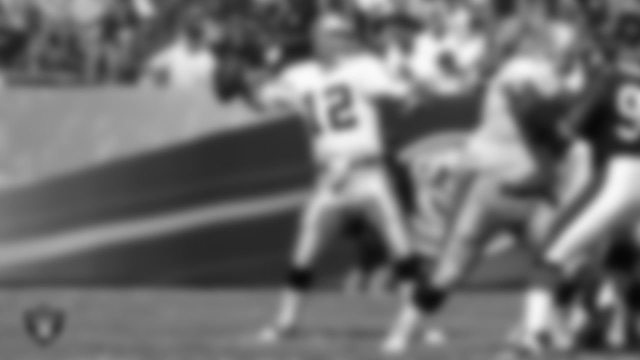 Oakland Raiders quarterback Rich Gannon (12) passes during the regular season away game against the Chicago Bears at Soldier Field, Sunday, October 5, 2003, in Chicago, Ill.