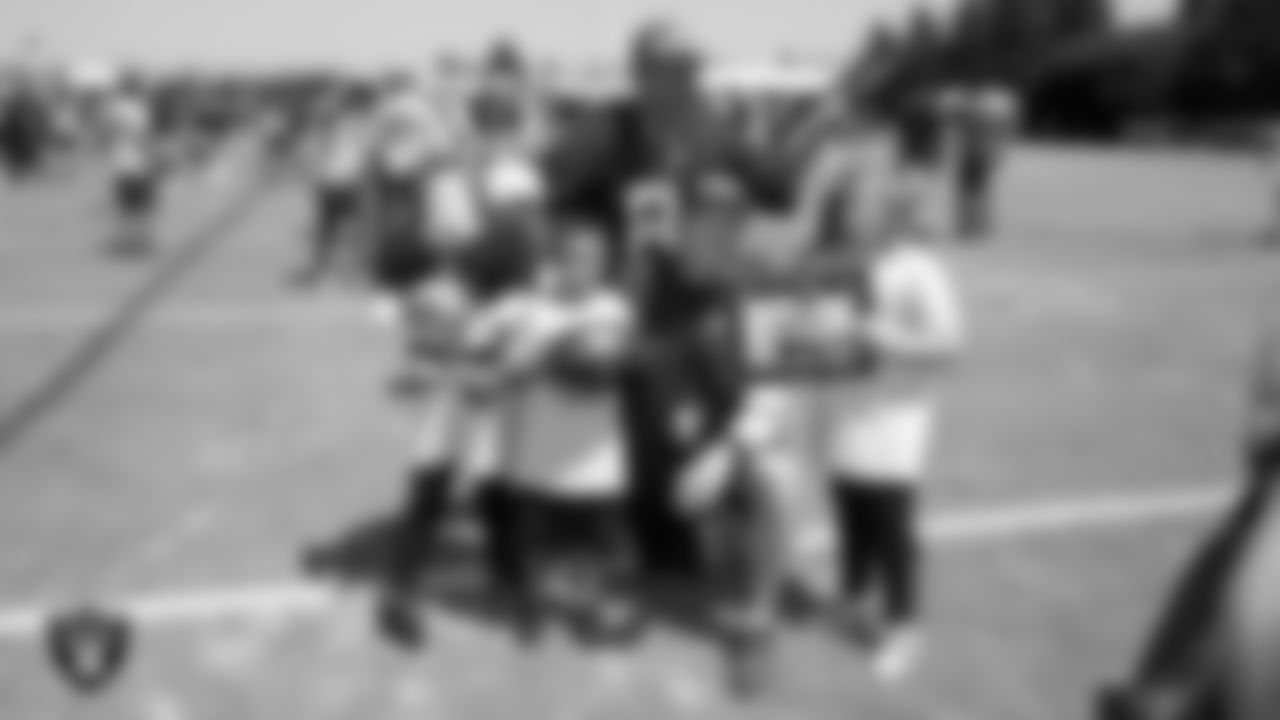 Raiders Head Coach Jon Gruden with fans during 2019 Training Camp.
