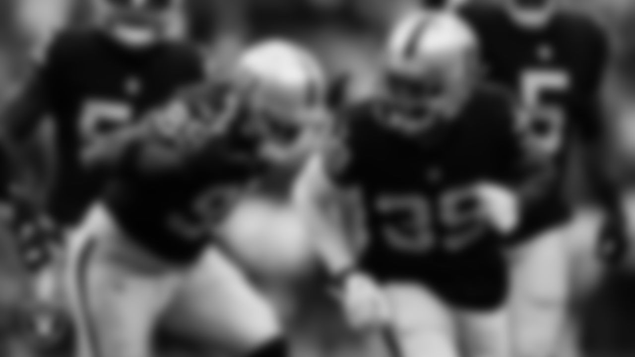 Las Vegas Raiders cornerback Nate Hobbs (39) celebrates after sacking the quarterback during the regular season home game against the Denver Broncos at Allegiant Stadium.