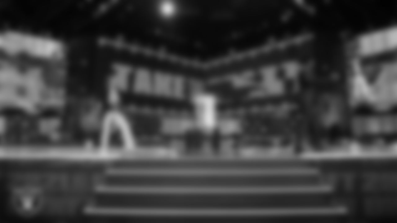 NFL Networks' host Colleen Wolfe and analyst Michael Irvin on stage during the 2021 NFL Draft on Friday, April 30, 2021 in Cleveland, Ohio. (Ben Liebenberg/NFL)