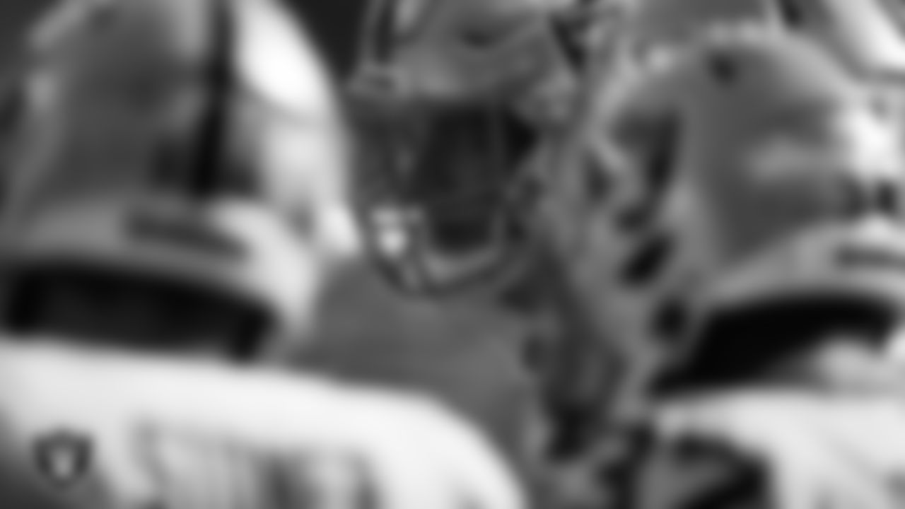 Las Vegas Raiders defensive end Carl Nassib (94) in a huddle during the regular season away game against the New York Giants.