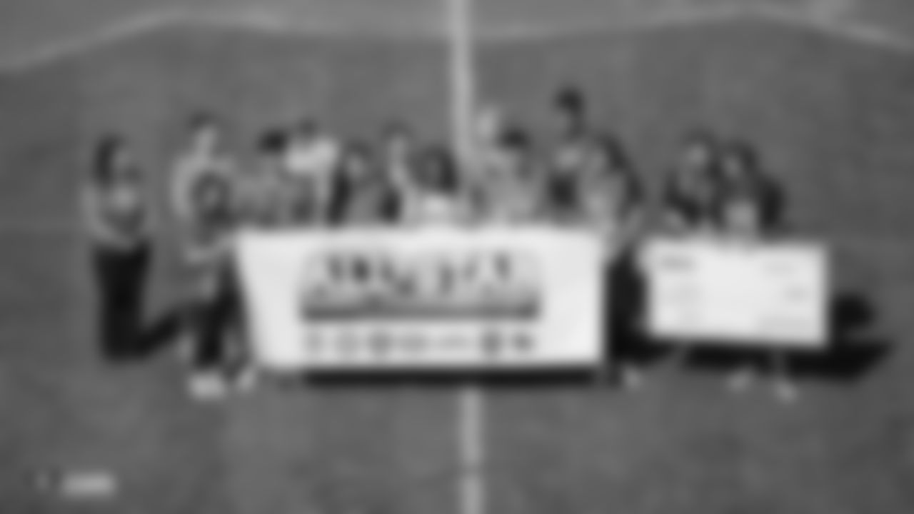 The Bay Area All-Stars Scholarship Team recipients are honored on the field before the Raiders preseason game against the Los Angeles Rams.