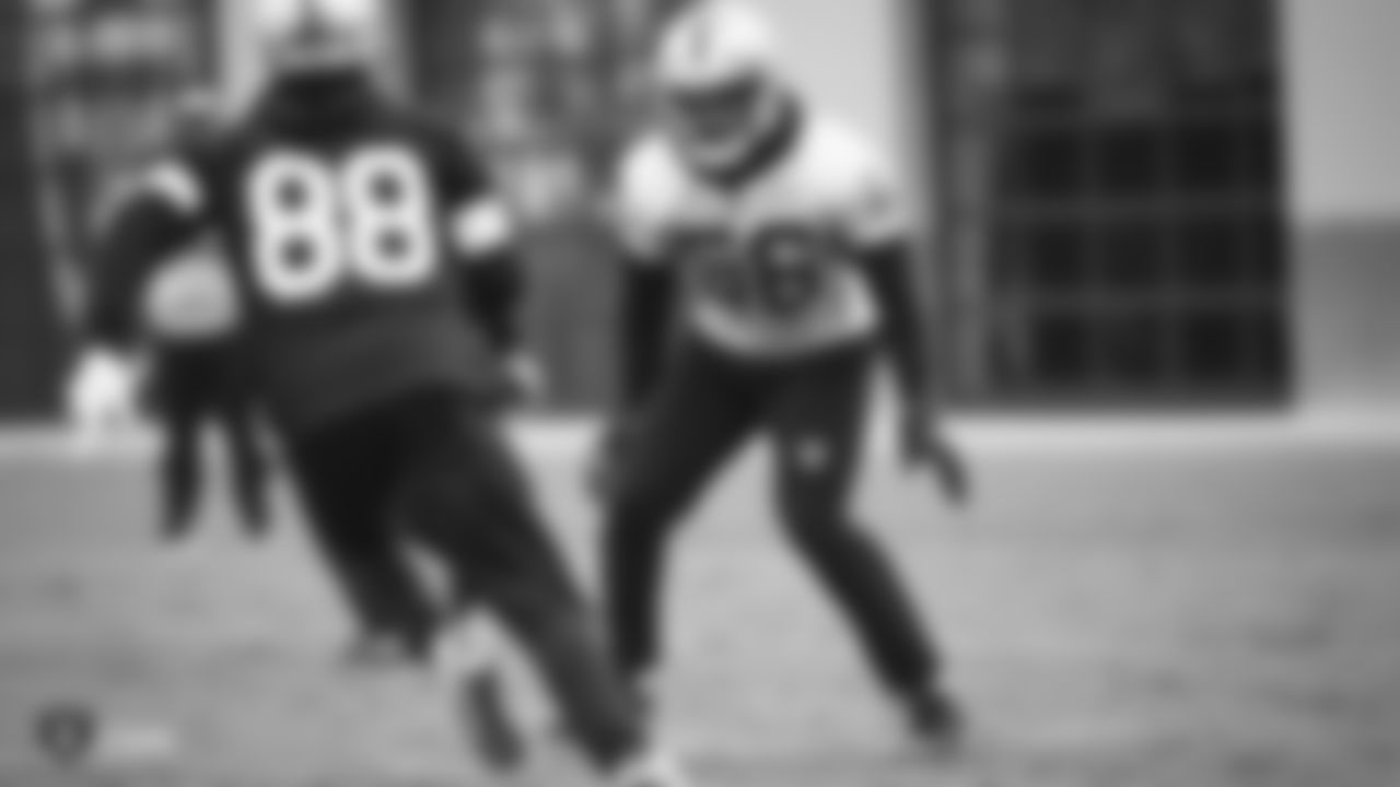 Raiders linebacker Te'von Coney (56) defends during practice.