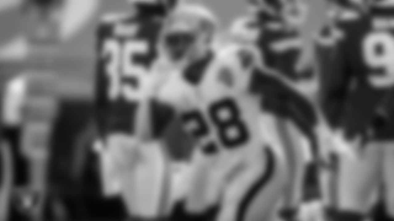 Las Vegas Raiders running back Josh Jacobs (28) celebrates after rushing for a 7-yard touchdown during the regular season away game against the Kansas City Chiefs.