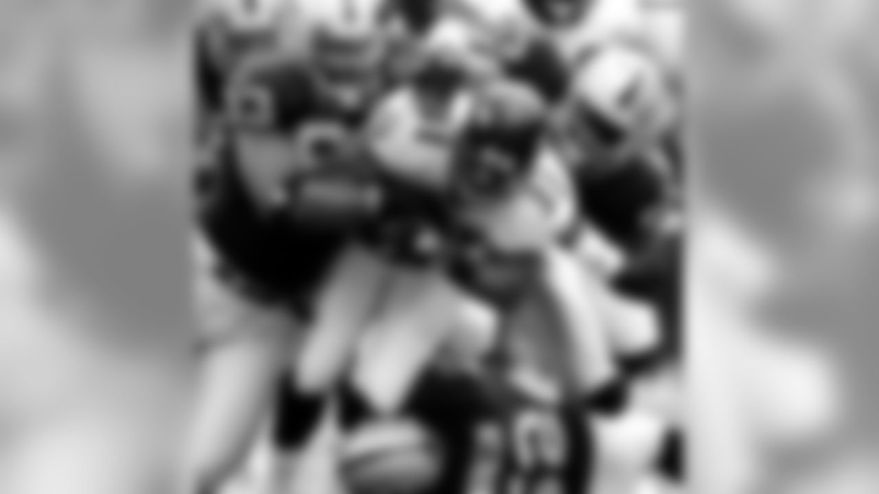 Photos of the Raiders taking on the Baltimore Ravens through the years.