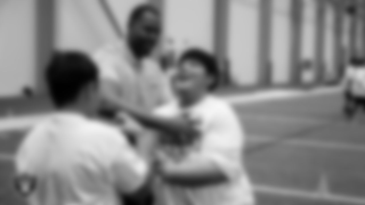 Las Vegas Raiders alumnus Matt McCants works with athletes as they participate in drills during the ELITE Academy at Las Vegas Raiders Headquarters.