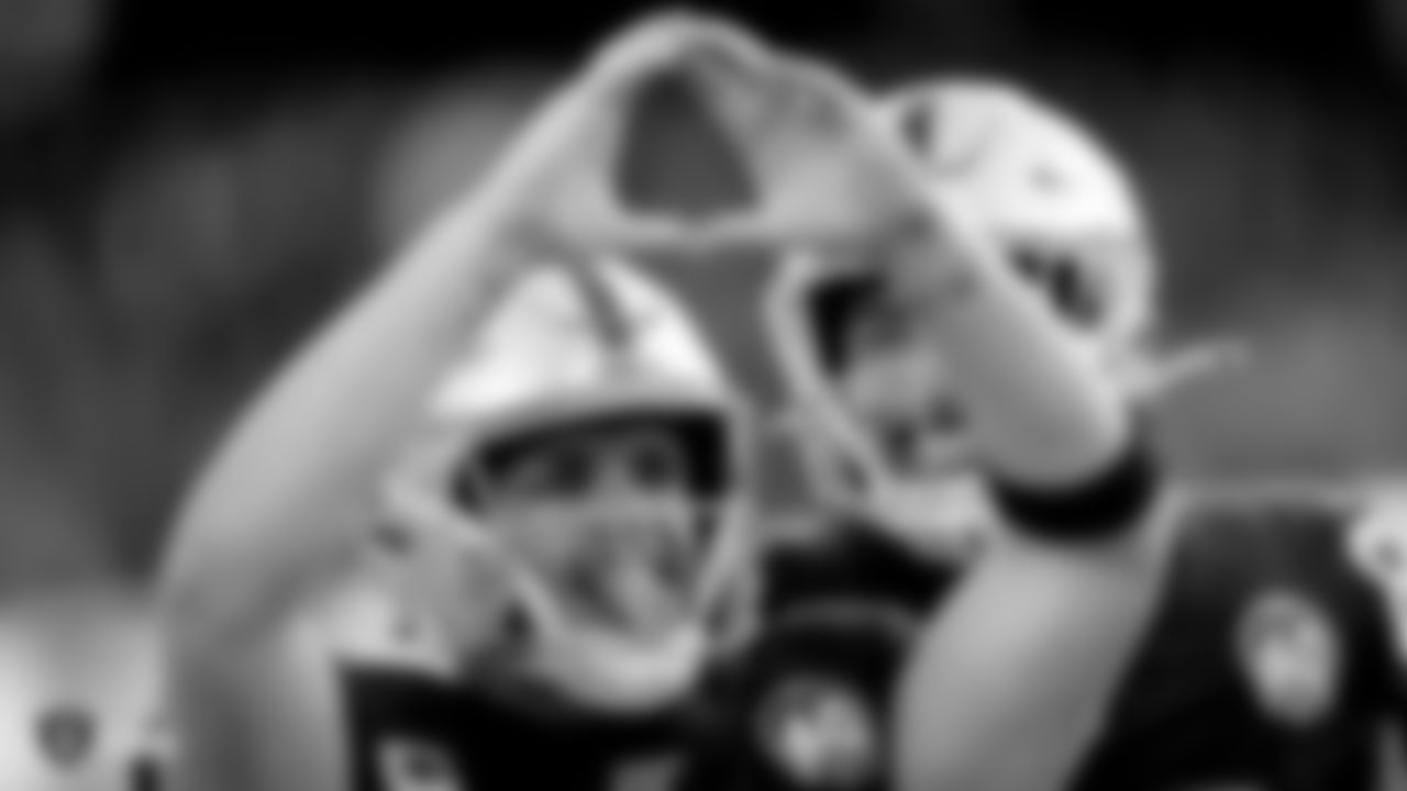 Raiders quarterback Derek Carr (4) celebrates during the regular season game against the Jacksonville Jaguars.