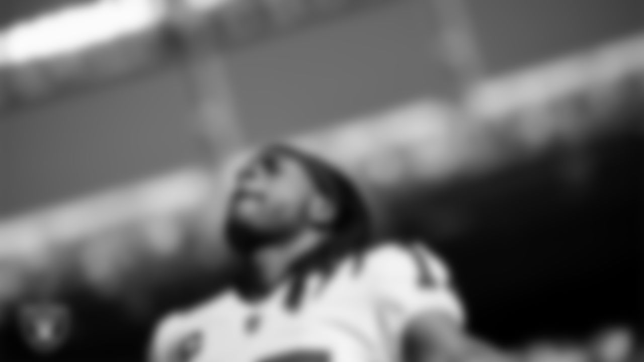 Las Vegas Raiders wide receiver Davante Adams (17) during the national anthem before the regular season away game against the Denver Broncos at Empower Field at Mile High.