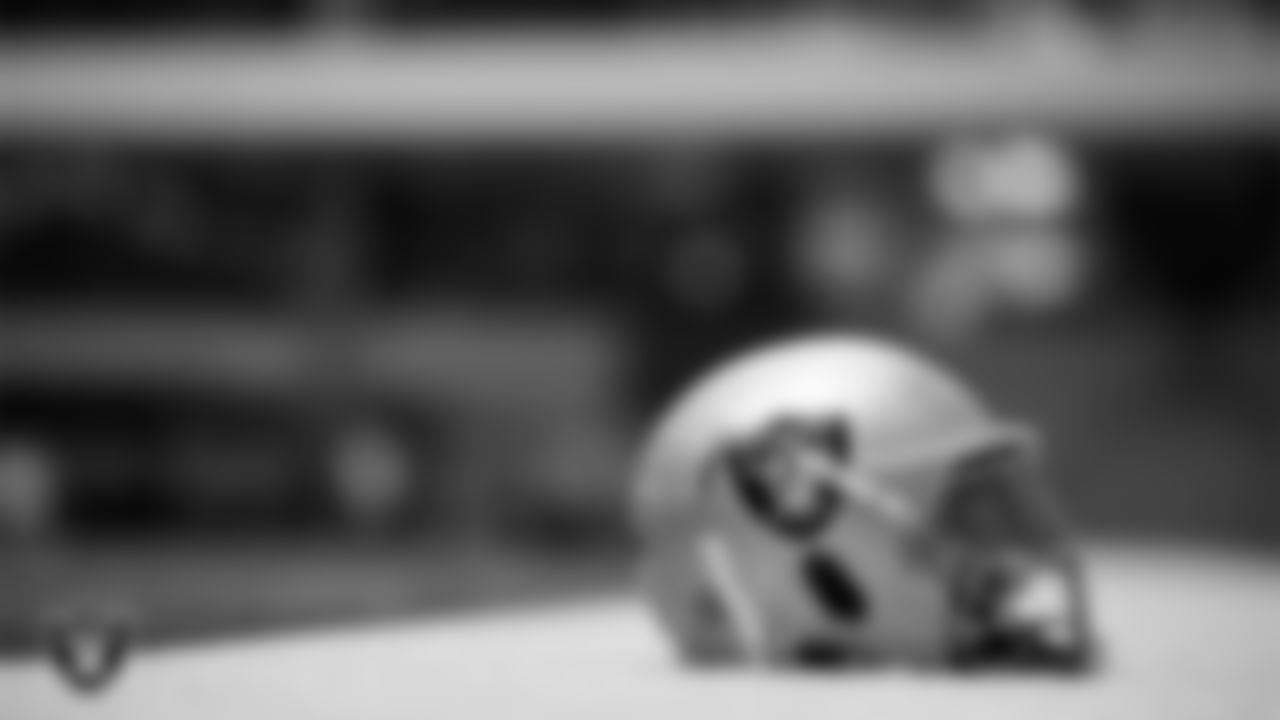A Las Vegas Raiders helmet on the field during practice at Intermountain Healthcare Performance Center.
