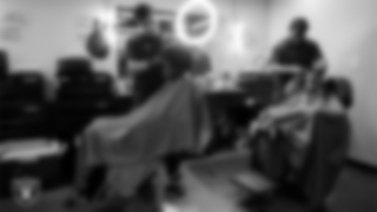 Students receive free haircuts and beautician services for the back to school season courtesy of the Las Vegas Raiders at Expertise Cosmetology Institute.