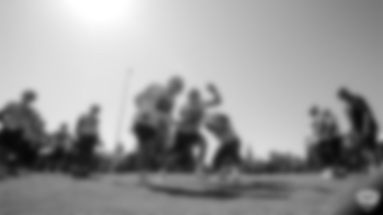 Oakland Raiders tackle Andre James (68), tackle Kolton Miller (74), and guard Richie Incognito (64) on the field for practice at 2019 Training Camp.
