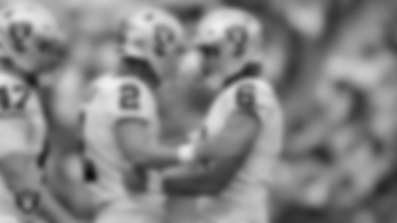 Las Vegas Raiders kicker Daniel Carlson (2) celebrates with punter AJ Cole (6) after making a 38-yard field goal during the regular season away game against the Jacksonville Jaguars at TIAA Bank Field.