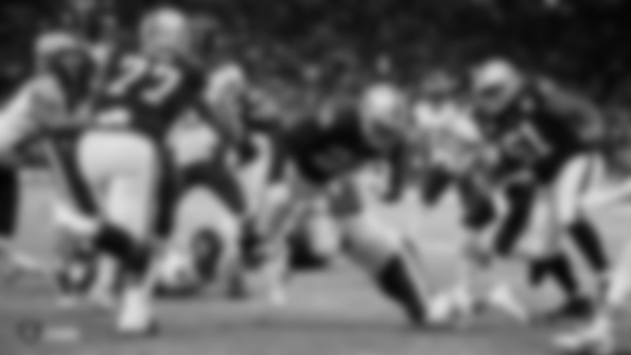 Raiders running back Josh Jacobs (28) rushes for a 12-yard touchdown during the regular season game against the Chicago Bears at Tottenham Hotspur Stadium.
