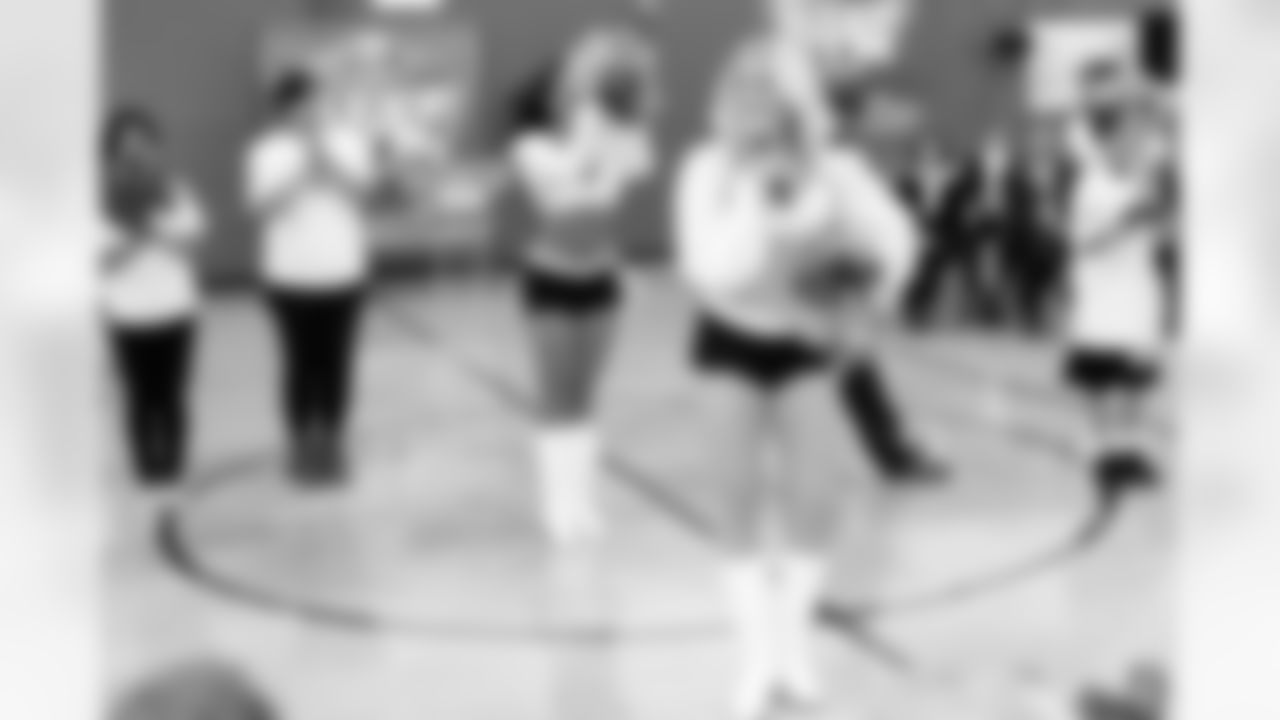 The Raiderettes teach some of the students a routine. Photo by Tony Gonzales.