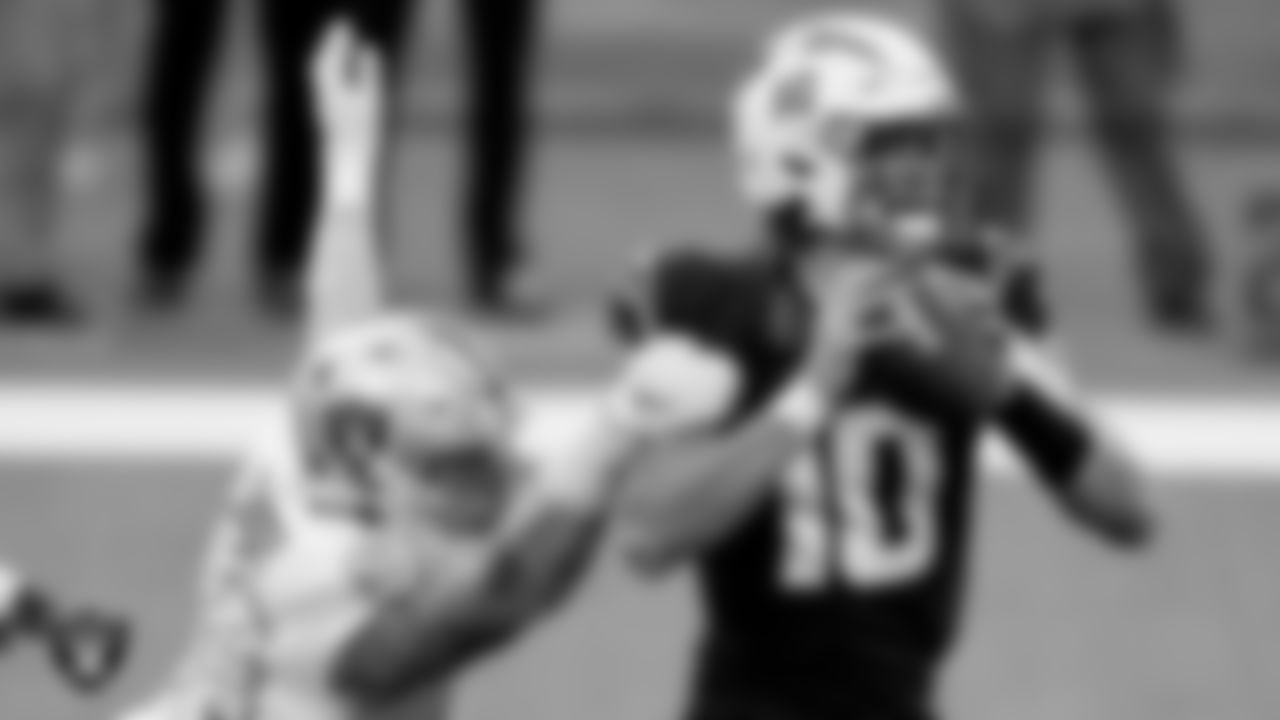Las Vegas Raiders defensive end Maxx Crosby (98) sacks the quarterback during the regular season away game against the Los Angeles Chargers.