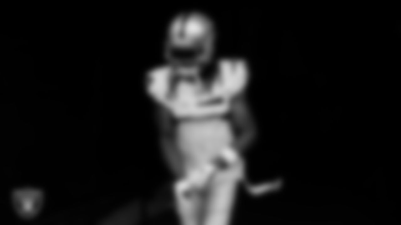 Las Vegas Raiders wide receiver Davante Adams (17) walks down the tunnel before the regular season away game against the Denver Broncos at Empower Field at Mile High.