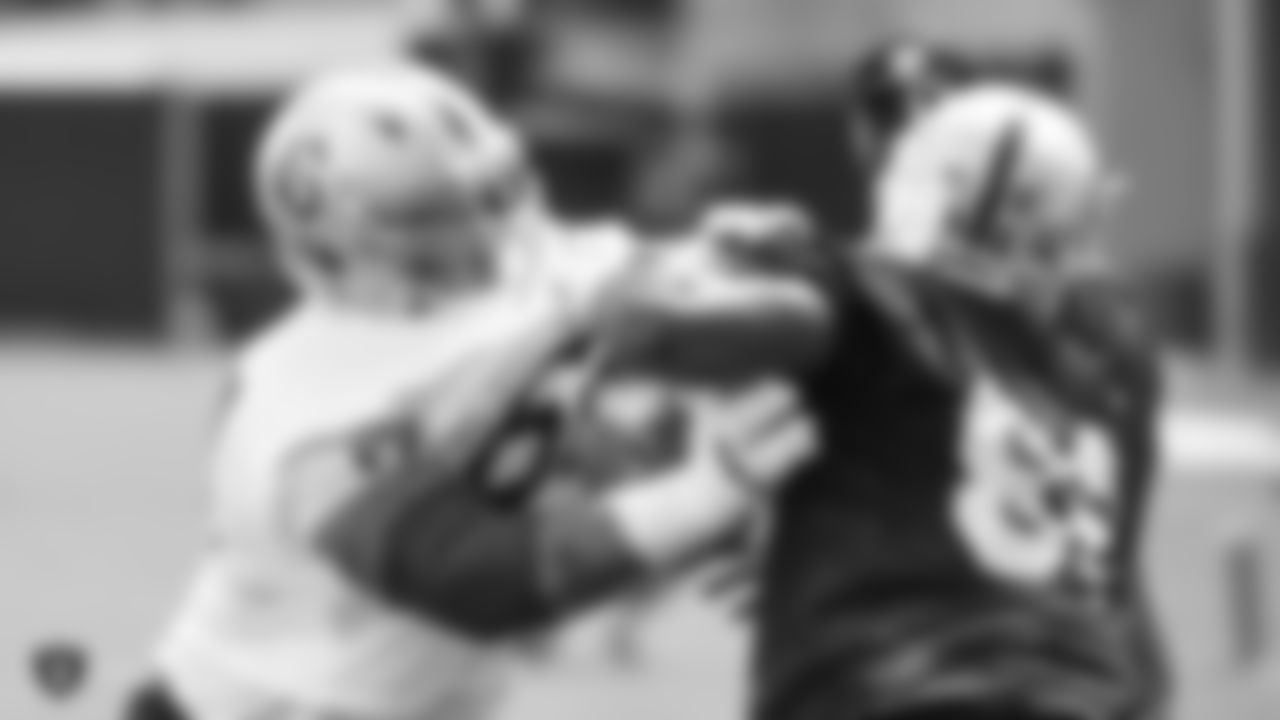 Raiders defensive end Clelin Ferrell (96) and guard Richie Incognito (64) at a Mandatory Minicamp at the Raiders Practice Facility in Alameda, Calif.