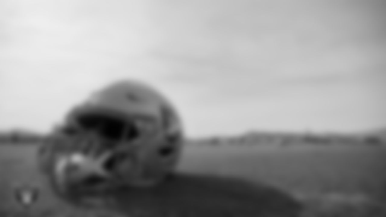 A Las Vegas Raiders helmet on the field during practice at Intermountain Healthcare Performance Center.