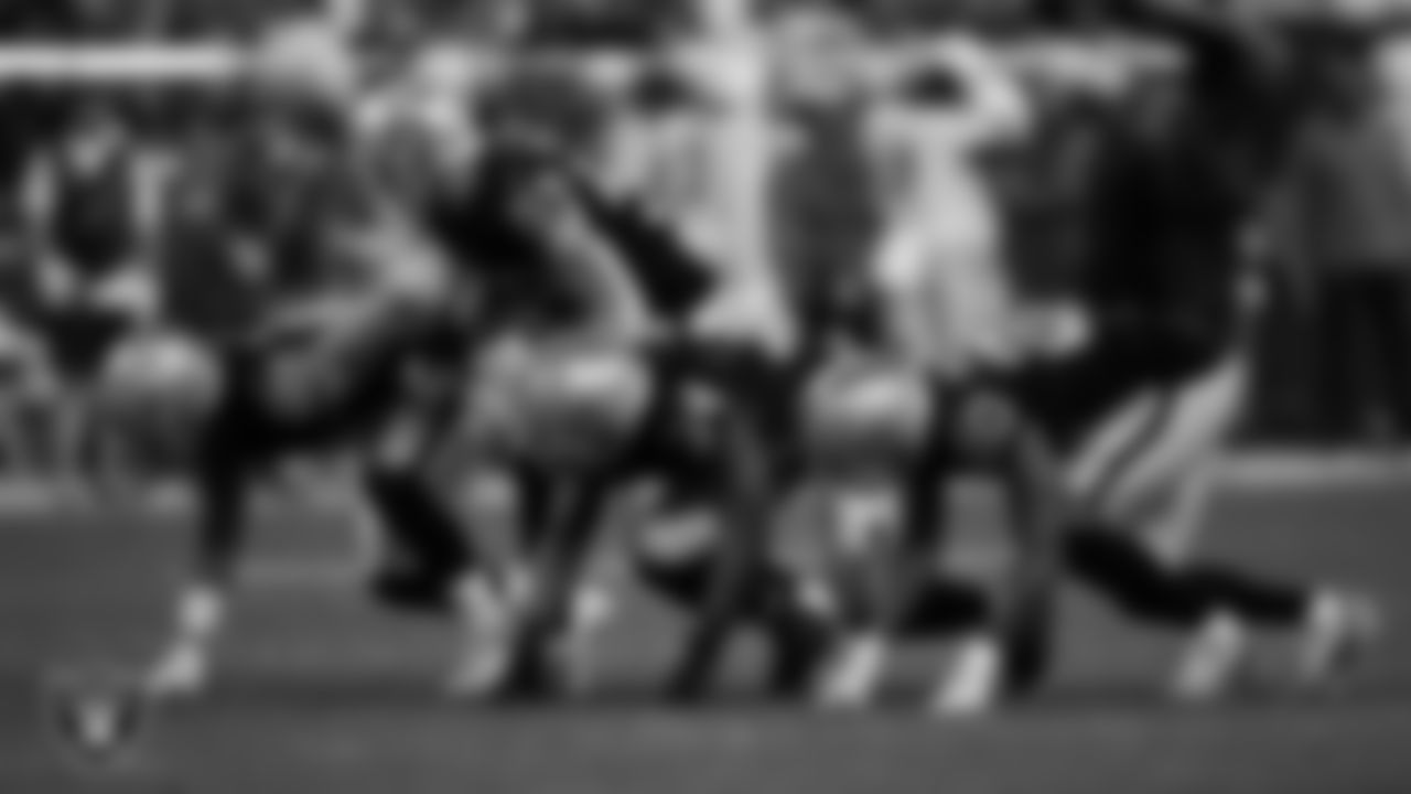 Las Vegas Raiders tight end Jacob Hollister (88), linebacker Luke Masterson (59), running back Brandon Bolden (34) and safety Isaiah Pola-Mao (20) line up before a punt during the regular season home game against the Los Angeles Chargers at Allegiant Stadium.