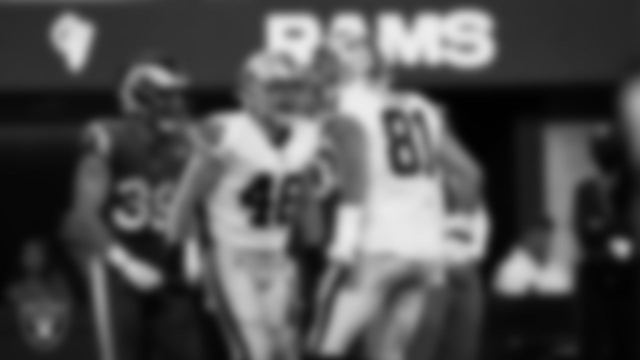 Las Vegas Raiders running back Garrett Groshek (46) and tight end Alex Ellis (81) celebrate after a play during the preseason away game against the Los Angeles Rams.