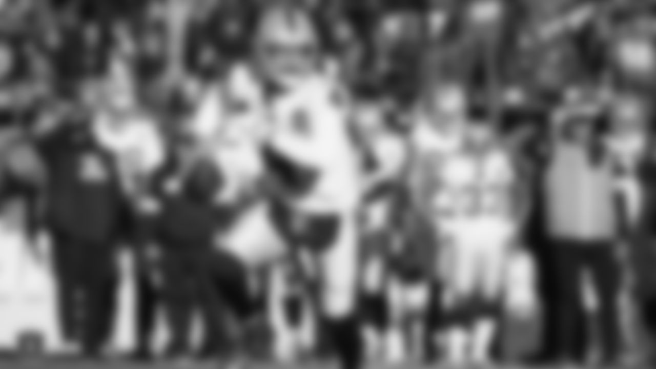 The Raiders during the regular season game against the Denver Broncos at Empower Field at Mile High.