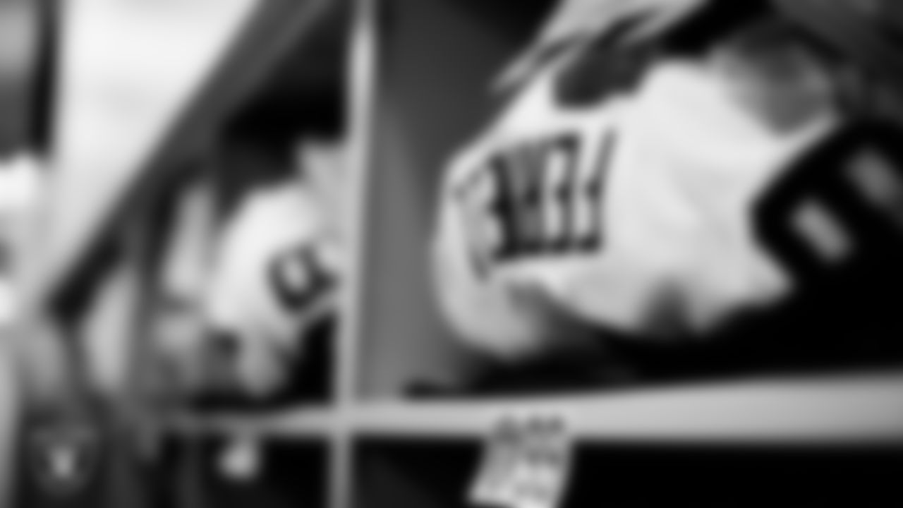 Las Vegas Raiders defensive end Clelin Ferrell's (99) pads in the locker room prior to the Raiders' arrival for their preseason away game against the Los Angeles Rams at SoFi Stadium.