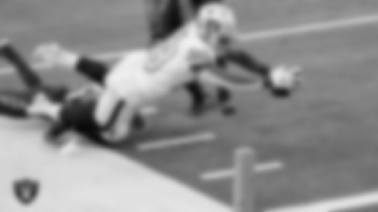 Las Vegas Raiders running back Josh Jacobs (28) rushes for a 14-yard touchdown during the regular season away game against the Los Angeles Chargers.