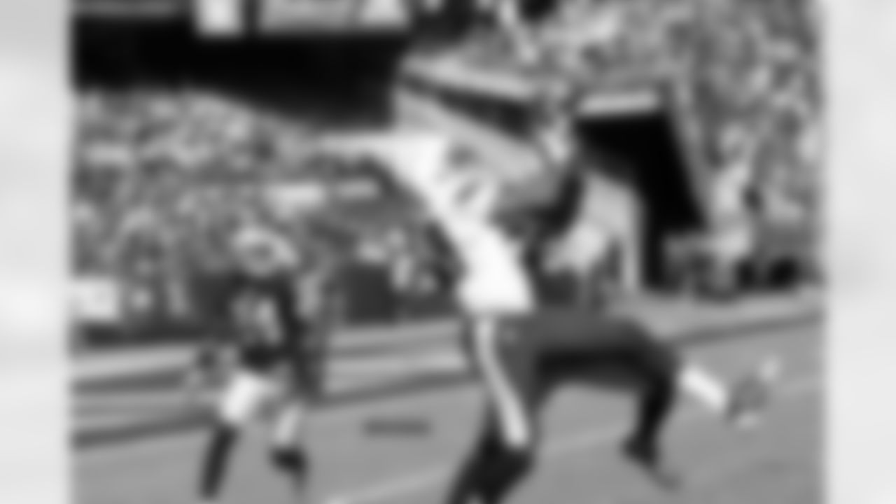 S Usama Young breaks up the pass.