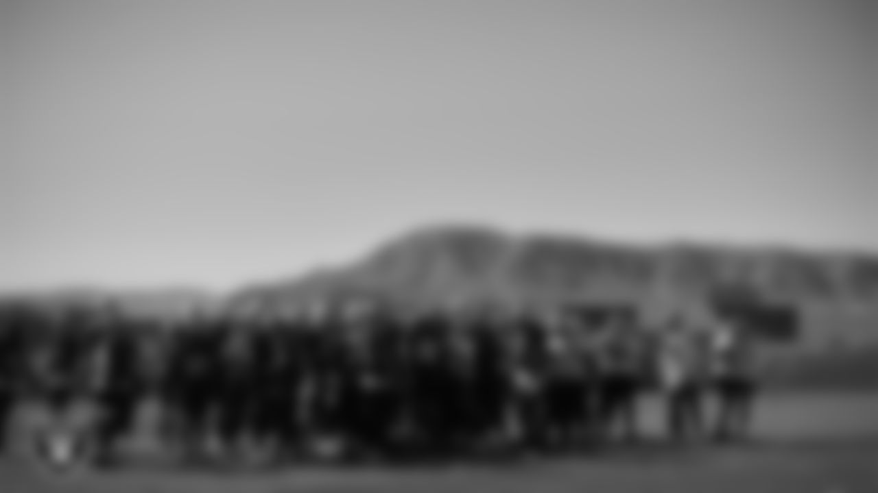 The Las Vegas Raiders huddle during practice at Intermountain Healthcare Performance Center.
