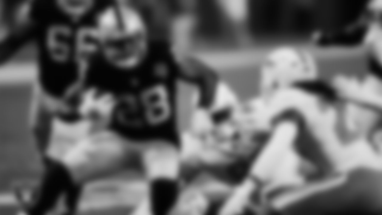 Las Vegas Raiders running back Josh Jacobs (28) rushes during the regular season home game against the Miami Dolphins.