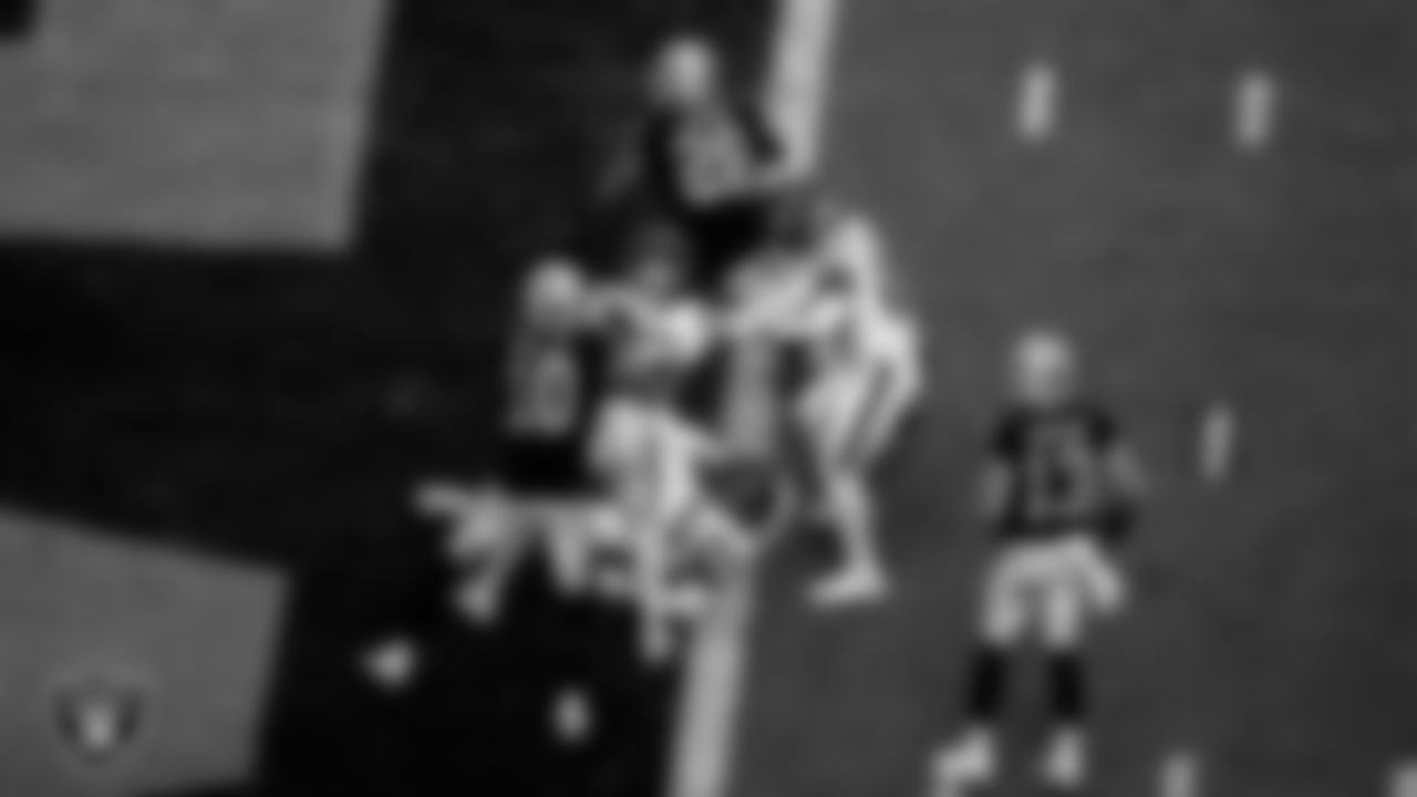Las Vegas Raiders running back Josh Jacobs (28) rushes for a 7-yard touchdown during the regular season home game against the Houston Texans at Allegiant Stadium.