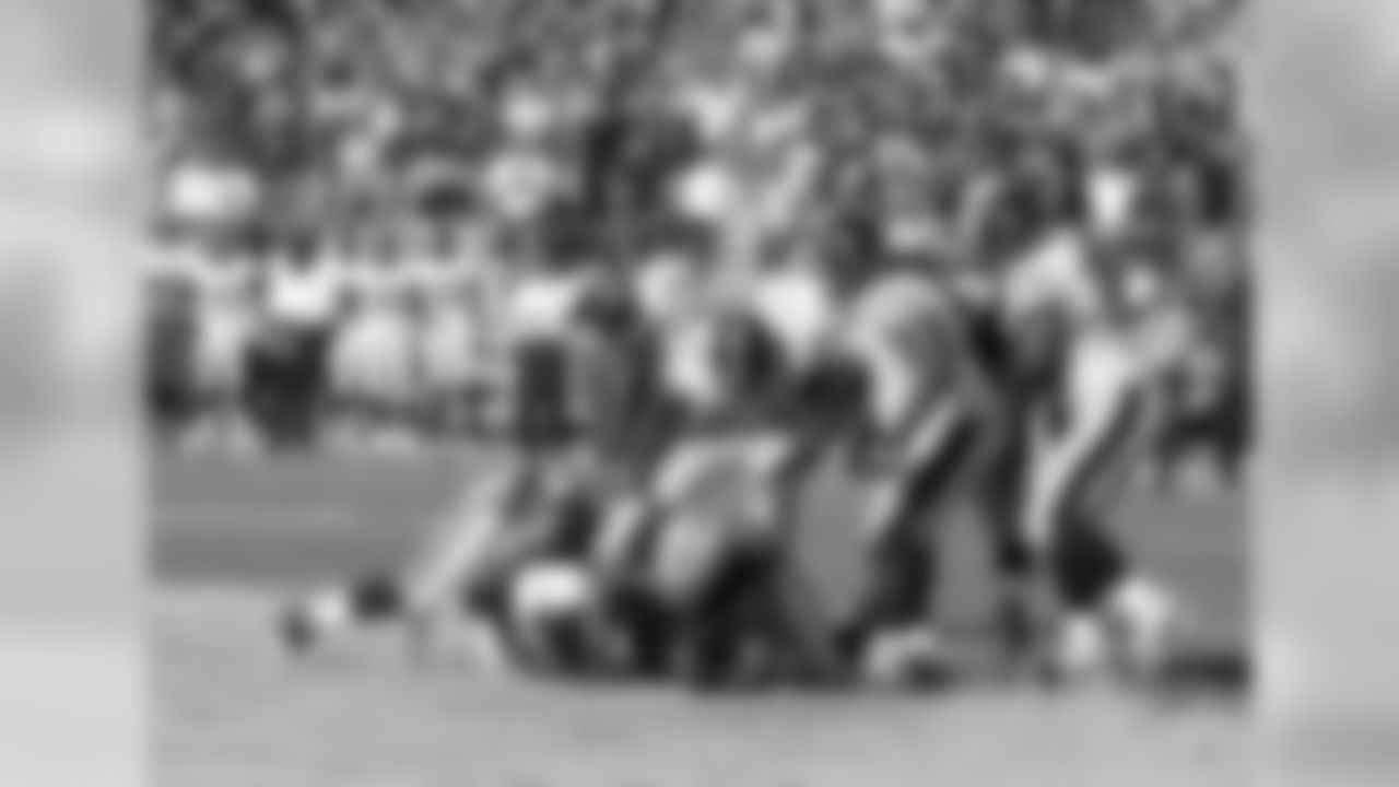 DT Richard Seymour and DE Lamarr Houston take down QB Ben Roethlisberger.