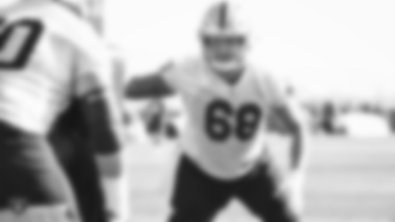 Raiders offensive lineman Andre James (68) goes through offensive drills during practice.