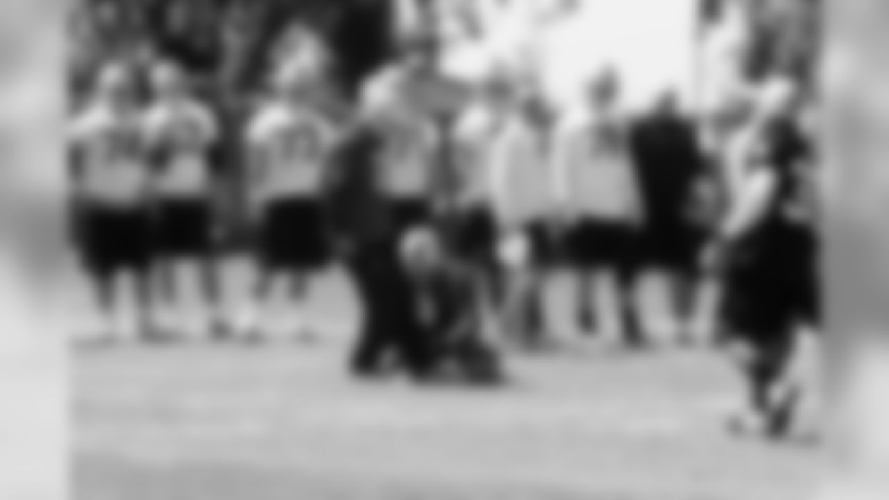 K Sebastian Janikowski boots the ball during a special teams drill.