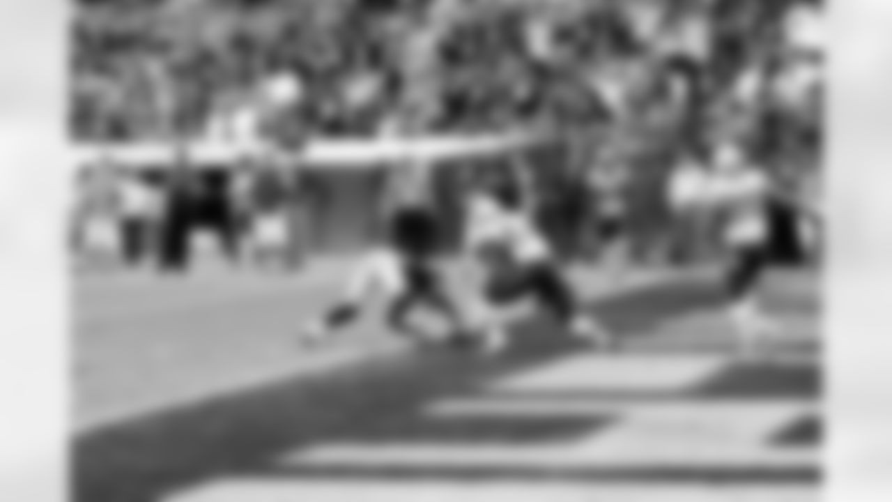 WR Denarius Moore makes sure the ball crosses the goal line for a TD.