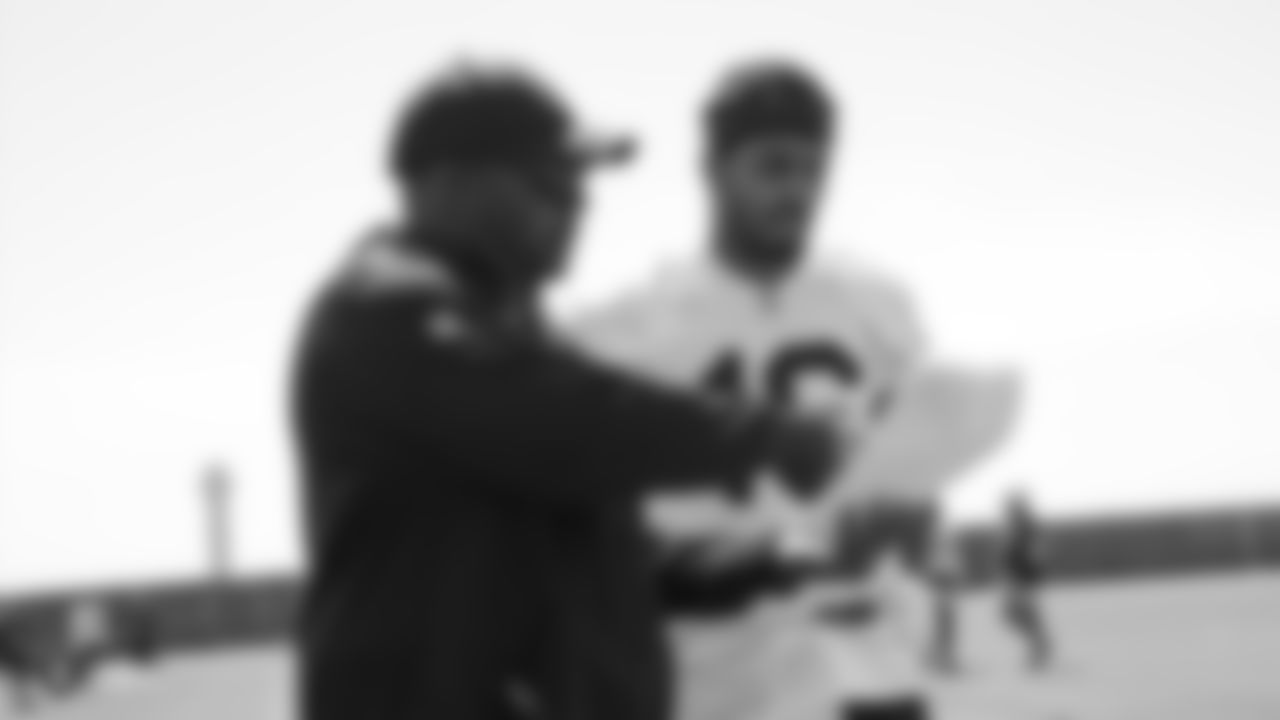 Raiders wide receivers coach Edgar Bennett and wide receiver Tyrell Williams (16) at an Organized Team Activity (OTA) at the Raiders Practice Facility in Alameda, Calif.